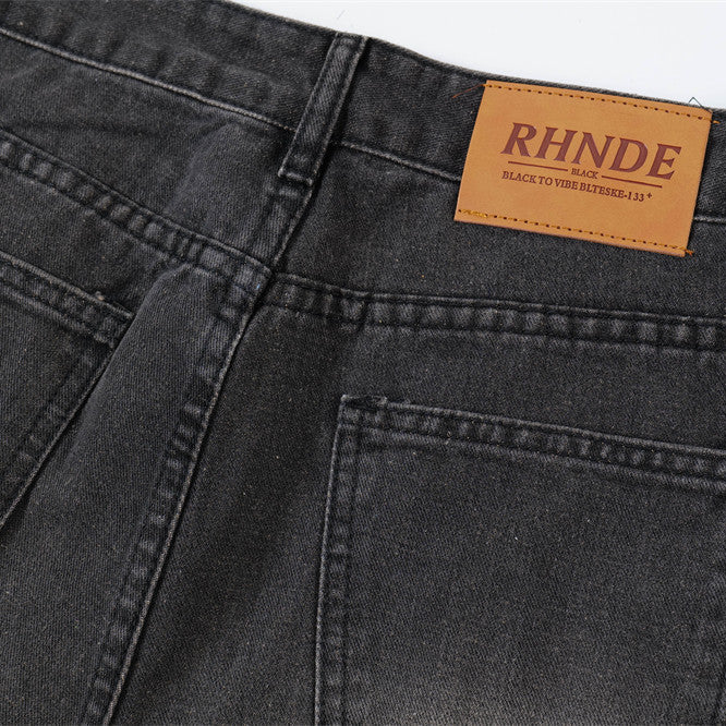 Ripped Wide-legged Denim Trousers