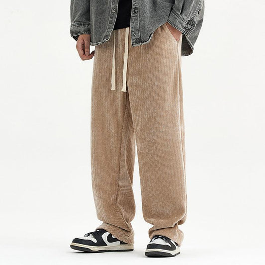Corduroy draped knit sweatpants in khaki with a relaxed fit and drawstring waist.