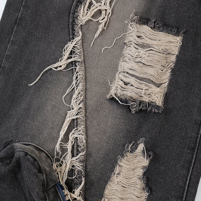 Ripped Wide-legged Denim Trousers