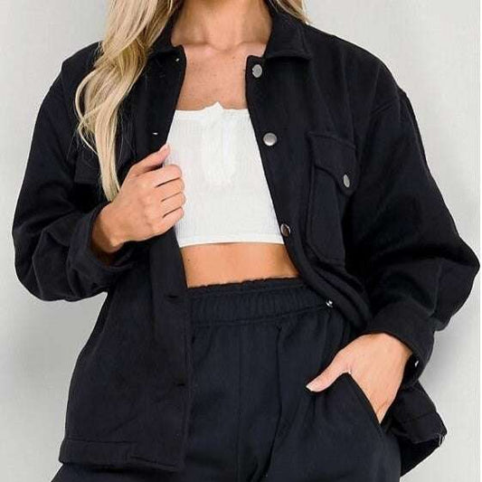 Black collar coat streetwear jacket with single-breasted buttons and long sleeves.