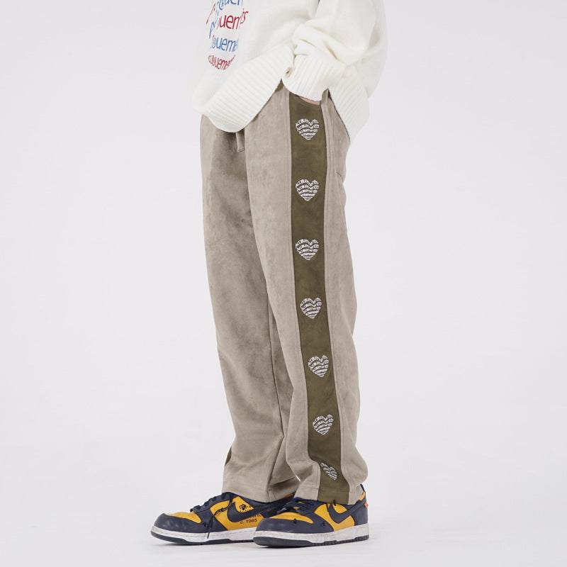 Embroidered velvet sweatpants with straight cut and heart pattern stripe on side